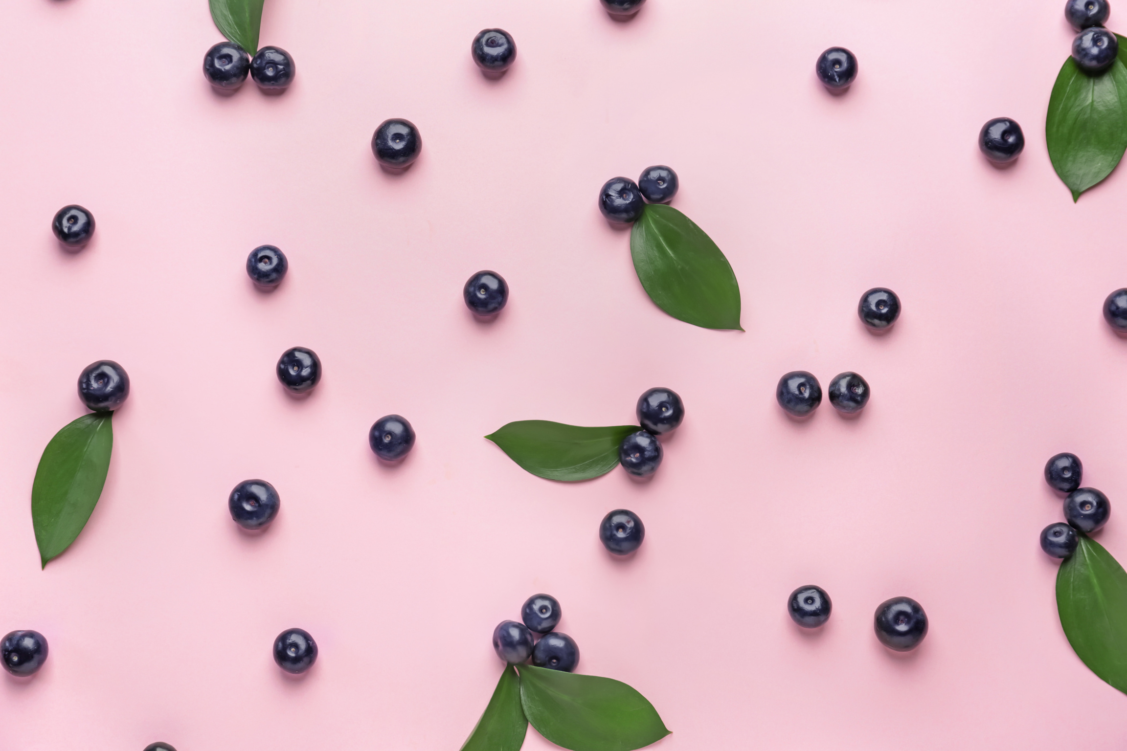 Fresh Acai Berries on Color Background